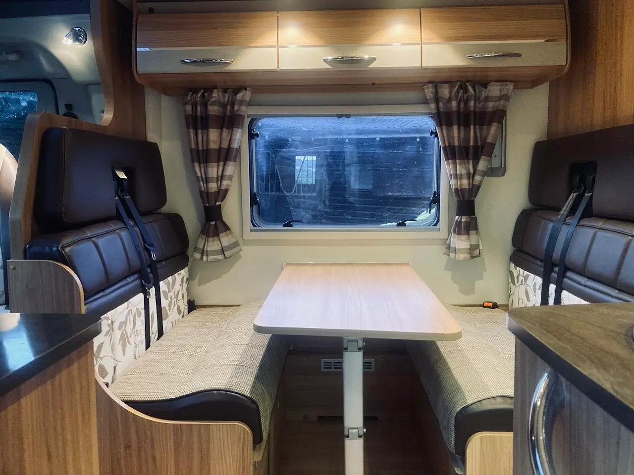 Front dining area inside the Bailey Approach 765