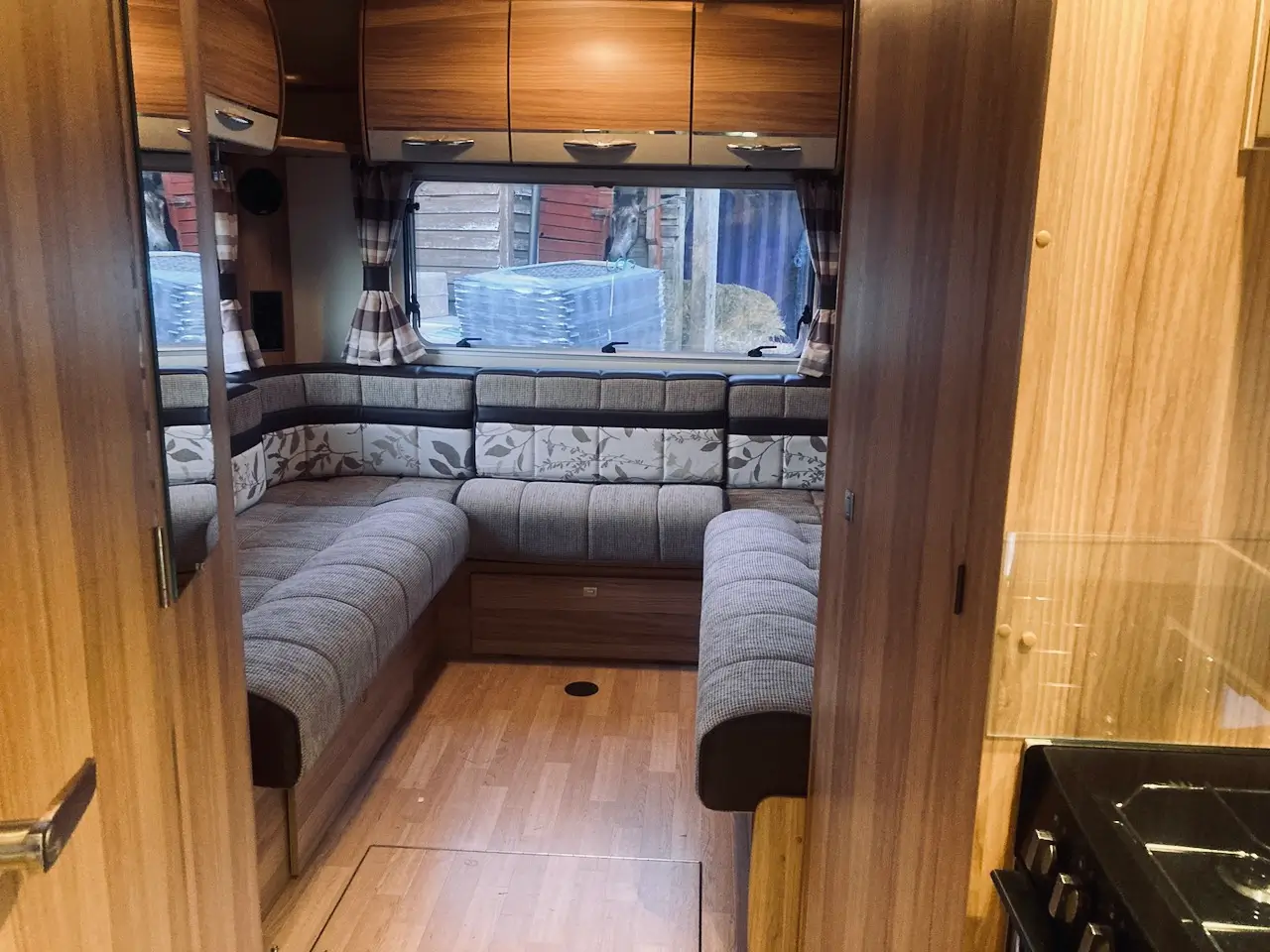 Spacious rear lounge inside the Bailey Approach 765